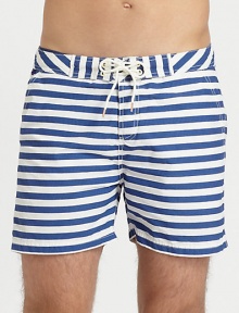 Summertime essential in a crisp, cotton blend finished in bold stripes for a nautical-inspired feel.Drawstring-tie waistSide slash, back welt pocketsInseam, about 465% cotton/35% nylonMachine washImported Summertime essential in a crisp, cotton blend finished in bold stripes for a nautical-inspired feel.Drawstring-tie waistSide slash, back welt pocketsInseam, about 465% cotton/35% nylonMachine washImported