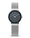 Skagen's modern take on time starts with this watch with a black/silver dial framed by a prominent black bezel. Swarovski crystal hour indices and finished with a silver mesh band.