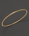 Stunningly simple, Roberto Coin's 18K gold satin bangle makes a subtle statement in a satin finish.