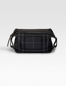 A must-have for the sophisticated traveler, crafted in durable nylon with tonal checks and plenty of room for grooming essentials. Zip closure 9½ X 5½H X 6D Nylon/leather Imported A must-have for the sophisticated traveler, crafted in durable nylon with tonal checks and plenty of room for grooming essentials. Zip closure 9½ X 5½H X 6D Nylon/leather Imported