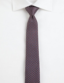 A sleek design, set in perfectly patterned Italian silk.About 2½ wideSilkDry cleanMade in Italy A sleek design, set in perfectly patterned Italian silk.About 2½ wideSilkDry cleanMade in Italy