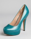 A simple platform pump shows a surprisingly exit with the addition of woven trim on the heel. From VINCE CAMUTO.