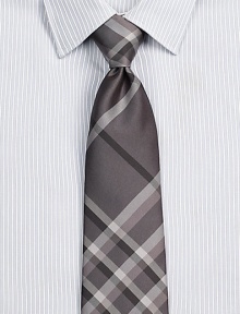 Smart checks in a sophisticated palette on pure Italian silk.About 3 wideSilkDry cleanMade in Italy Smart checks in a sophisticated palette on pure Italian silk.About 3 wideSilkDry cleanMade in Italy
