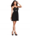 Metallic details and faux-leather up the edge on this GUESS little black dress -- perfect for a hot night out!