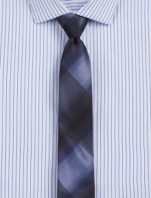 A sleek, sophisticated plaid design lends a handsome finish to your classic, tailored wardrobe.About 2½ wideSilkDry cleanMade in Italy A sleek, sophisticated plaid design lends a handsome finish to your classic, tailored wardrobe.About 2½ wideSilkDry cleanMade in Italy