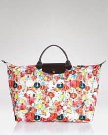 Longchamp's reliable French design goes graphic with this bright tote. Shoulder the color-splashed carryall for a practical pick-me-up--it's sized just right for all your essentials. Longchamp's reliable French design goes graphic with this bright tote. Shoulder the color-splashed carryall for a practical pick-me-up--it's sized just right for all your essentials.