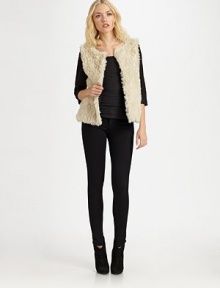Rich leather sleeves join plush faux fur for a unique and effortlessly cozy look.Boatneck Three quarter sleeves Hook and bar closure Fully lined 55% nylon/45% polyester Dry clean Imported Rich leather sleeves join plush faux fur for a unique and effortlessly cozy look.Boatneck Three quarter sleeves Hook and bar closure Fully lined 55% nylon/45% polyester Dry clean Imported