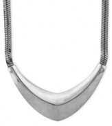 Futuristic fashion. Vince Camuto's double-chain statement pendant necklace is crafted from silver-tone mixed metal, giving it a post-modern look. Approximate length: 18 inches. Approximate drop: 1 inch.