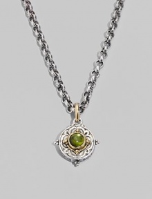 Chic little accent in gleaming sterling silver and 18k gold, centered with a smooth cabochon peridot stone. Chain sold separately About ½ diam Imported Chic little accent in gleaming sterling silver and 18k gold, centered with a smooth cabochon peridot stone. Chain sold separately About ½ diam Imported