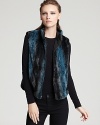 In fall-perfect ombre, this Aqua faux fur vest tops off your new collection with edge for a season of playful glamour.