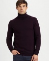 A handsome, cold-weather essential with long-lasting style, set in ribbed-knit wool for a streamlined silhouette.TurtleneckRibbed knit collar, cuffs and hemWoolDry cleanImported