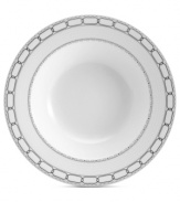 Watch a striking table take shape with the Calista rim soup bowl from Mikasa. Geometric patterns in sumptuous platinum lend bold style and variety to contemporary white porcelain.