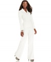 Le Suit's glamorous ivory pantsuit makes a stunning impression whether you're in the boardroom or at client dinner.  The tailored jacket and gently-flared trousers can be styled for day or night with ease.