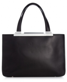 Polished and practical with lady-like charm, this take-anywhere tote from MICHAEL Michael Kors is an everyday essential. Luxurious leather is accented with sleek, silver-tone hardware, while the interior is outfitted with plenty of pockets and compartments for all the essentials. Polished and practical with lady-like charm, this take-anywhere tote from MICHAEL Michael Kors is an everyday essential. Luxurious leather is accented with sleek, silver-tone hardware, while the interior is outfitted with plenty of pockets and compartments for all the essentials.