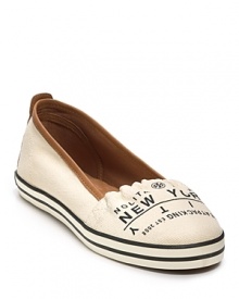 Rugged-luxe canvas slip-ons from Tory Burch make even the airport a little more glamourous. Rugged-luxe canvas slip-ons from Tory Burch make even the airport a little more glamourous.