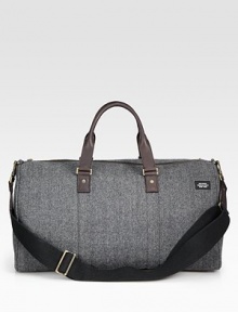 Inspired by suiting fabrics, this wool herringbone is a classic men's fabrication crafted for the stylish traveler.Zip closureDouble top handlesAdjustable shoulder strapWool/leather20W x 11H x 9DImported Inspired by suiting fabrics, this wool herringbone is a classic men's fabrication crafted for the stylish traveler.Zip closureDouble top handlesAdjustable shoulder strapWool/leather20W x 11H x 9DImported