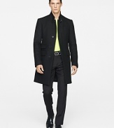 Defined by a long, lean silhouette and modern proportions, an essential gentleman's coat is tailored in luxe wool with a removable vest for handsome versatility.