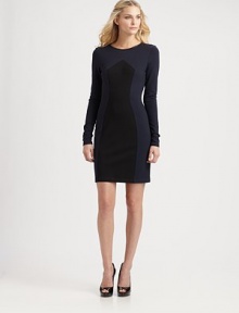 A touch of colorblocking and mixed-media trim give this sleek knit dress an unforgettable look. Round neckLong sleevesContrasting insetConcealed back zipperAbout 19 from natural waistRayon/nylon/spandexDry cleanMade in USA of imported fabric Model shown is 5'10 (177cm) wearing US size Small. 