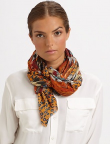 A lightweight cashmere and silk blend wrap is adorned with a vivid, tribal-inspired print and eyelash trim.55% cashmere/45% silk28 X 80Dry cleanImported A lightweight cashmere and silk blend wrap is adorned with a vivid, tribal-inspired print and eyelash trim.55% cashmere/45% silk28 X 80Dry cleanImported