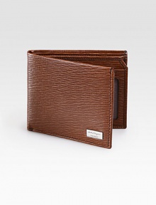 Stamped calfskin leather wallet is beautifully crafted in Italy featuring two credit card slots, two currency departments and one transparent Identification window.Two billfold compartmentsTwo card slotsOne Identification windowLeather4W x 3HMade in Italy Stamped calfskin leather wallet is beautifully crafted in Italy featuring two credit card slots, two currency departments and one transparent Identification window.Two billfold compartmentsTwo card slotsOne Identification windowLeather4W x 3HMade in Italy