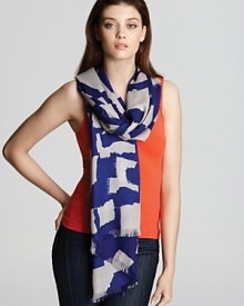 Accent your wardrobe with this modern work of art, an abstract print scarf designed by kate spade new york in bold blue and gray graphics. Accent your wardrobe with this modern work of art, an abstract print scarf designed by kate spade new york in bold blue and gray graphics.