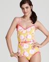 MARC BY MARC JACOBS channels swinging sixties style with this bright floral print maillot.