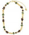 Earthy tones. Jones New York combines classic green, brown and gold on this strand necklace. Crafted from gold tone mixed metal and features plastic and resin beads. Approximate length: 17 inches + 3-inch extender.