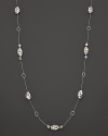 Gleaming, pebbled sterling silver beads alternate with oval links to form a dramatic necklace. From the John Hardy Kali Pebble colleciton.
