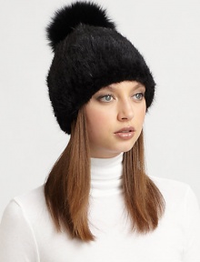Destined to turn heads, a natural mink hat with a plush, dyed fox-fur pom pom. Dry clean by fur specialistImportedMink fur origin: DenmarkFox fur origin: China Destined to turn heads, a natural mink hat with a plush, dyed fox-fur pom pom. Dry clean by fur specialistImportedMink fur origin: DenmarkFox fur origin: China
