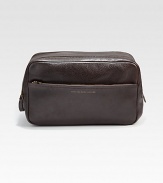 A traveling essential, crafted from rich textured leather.One side handleDouble zip and magnetic closureExterior, interior pocketsRemovable interior bagLeather10W x 6¼H x 4¾DImported
