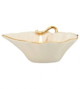 Fresh pick. The Eternal Leaf candle holder from Lenox captures the intricacies of flora in fine ivory porcelain with polished gold trim.