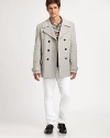 EXCLUSIVELY OURS. Clean lines and classic tailoring shapes and defines this outerwear essential, structured in a luxurious wool blend.Button-frontWaist flap pocketsRear ventAbout 31 from shoulder to hem80% wool/20% nylonDry cleanImported of Italian fabric