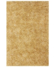 Add rich, shimmering texture to any modern room with the Metallic beige area rug from Dalyn. Hand-tufted of soft polyester, this high-luster shag area rug puts comfort and fun back in floor decor. Add rich, shimmering texture to any modern room with the Metallic beige area rug from Dalyn. Hand-tufted of soft polyester, this high-luster shag area rug puts comfort and fun back in floor decor.