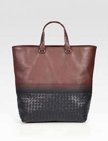 Lightweight, luxurious everyday tote rendered in fine Italian leather with signature woven detail at the handles and base.Top handlesInterior zip pocketCotton liningLeather16W x 15H x 6DMade in Italy Lightweight, luxurious everyday tote rendered in fine Italian leather with signature woven detail at the handles and base.Top handlesInterior zip pocketCotton liningLeather16W x 15H x 6DMade in Italy
