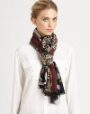 An artistic leopard and forest print adorns a woven, sumptuous cashmere wrap.CashmereAbout 36 X 80Dry cleanImported