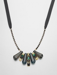 Faceted resin, sparkling stones and radiant metals come together to create a piece with a tribal-inspired design. ResinGlassBrassPolyesterLength, about 17.7Tie closureMade in Italy and imported Faceted resin, sparkling stones and radiant metals come together to create a piece with a tribal-inspired design. ResinGlassBrassPolyesterLength, about 17.7Tie closureMade in Italy and imported