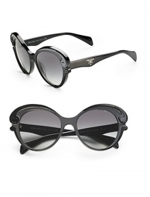 Sophisticated design in a round shape with swirl accents. Available in black with gradient blue lens, havana brown with gradient brown lens, or tortoise/black with brown gradient lens.Acetate frame with crystal lens Prada logo on temple 100% UV protective Made in Italy Sophisticated design in a round shape with swirl accents. Available in black with gradient blue lens, havana brown with gradient brown lens, or tortoise/black with brown gradient lens.Acetate frame with crystal lens Prada logo on temple 100% UV protective Made in Italy