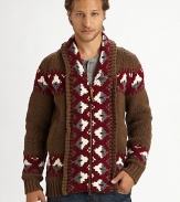 This handmade chunky zip-up, with a unique ethnic pattern, is ideal for layering. Shawl collarFront zip closure Long ribbed cuff sleeves Ribbed hem 50% wool/50% acrylicDry clean Imported 