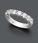 The perfect addition. Complement your diamond engagement ring with this standout wedding band. Seven stations of IGI Certified, round-cut diamonds (1-1/2 ct. t.w.) shine in a 14k white gold setting.