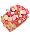 A blooming beauty! Wear the latest trend well in Style&co.'s statement-making stretch bracelet. Coral and pink-colored shells, glass and seed beads form an intricate floral pattern. Bracelet stretches to fit wrist. Approximate length: 7 inches.