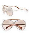 A unique style with a sleek acetate covered bridge. Available in shiny rose gold/grey acetate with grey gradient lens or shiny rose gold/havana acetate with blush gradient lens. Metal frame with acetate details100% UV protectionMade in Italy 