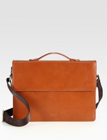 A streamlined yet structured take on the classic briefcase, constructed in smooth, refined leather with a top handle and an adjustable and removable shoulder strap for added comfort and convenience.Magnetic flap closureTop handleAdjustable shoulder strapInterior zip pocketFully lined Leather15W x 11H x 3DImported A streamlined yet structured take on the classic briefcase, constructed in smooth, refined leather with a top handle and an adjustable and removable shoulder strap for added comfort and convenience.Magnetic flap closureTop handleAdjustable shoulder strapInterior zip pocketFully lined Leather15W x 11H x 3DImported