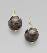 From the Star Collection. A simply chic design with a dark sterling silver ball accented with a white sterling silver star cap and 24k gold details. Dark and white sterling silver24k goldDrop, about 1¼Hook backImported 