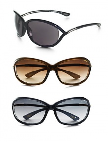 Sleek plastic frames hold floating lens. Available in black with smoke lens and silver temple, dark brown with brown gradient lens and gold temple, or dark grey with grey lens and gold temple. UV 400 lens 100% UV protection Made in Italy Sleek plastic frames hold floating lens. Available in black with smoke lens and silver temple, dark brown with brown gradient lens and gold temple, or dark grey with grey lens and gold temple. UV 400 lens 100% UV protection Made in Italy