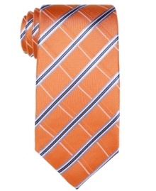 A big, bold pattern in a bright color palette gives this Tasso Elba tie instant presence. A big, bold pattern in a bright color palette gives this Tasso Elba tie instant presence.