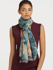 A luxurious style with hints of cashmere, finished with eyelash fringe and a colorful art-like print.90% modal/10% cashmereAbout 55 X 73Dry cleanImported A luxurious style with hints of cashmere, finished with eyelash fringe and a colorful art-like print.90% modal/10% cashmereAbout 55 X 73Dry cleanImported