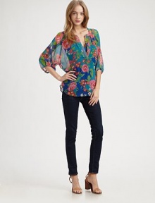 Gorgeous florals highlight crinkled silk chiffon in this easy split-neck top.Band collarSplit V necklineGathered sleevesShirttail hemAbout 26 from shoulder to hemSilkDry cleanImportedModel shown is 5'9 (175cm) wearing US size Small.