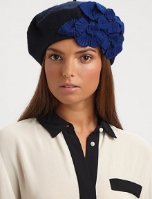 A retro-inspired, wool-blend knit topper with a pleated floral design.Pull-on style with concealed elastic bandWoolDry clean onlyImported A retro-inspired, wool-blend knit topper with a pleated floral design.Pull-on style with concealed elastic bandWoolDry clean onlyImported