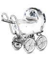 A fantastic gift for the new parents! In multifaceted cut-crystal, Swarovski has designed a fanciful little baby carriage. Decorative metal accents surround the figurine and the wheels actually turn.