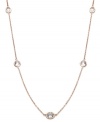 Layer yourself with inches of sparkle. This delicate necklace is crafted in 14k rose gold over sterling silver, with round-cut white topaz stations (9 ct. t.w.). Approximate length: 36 inches.